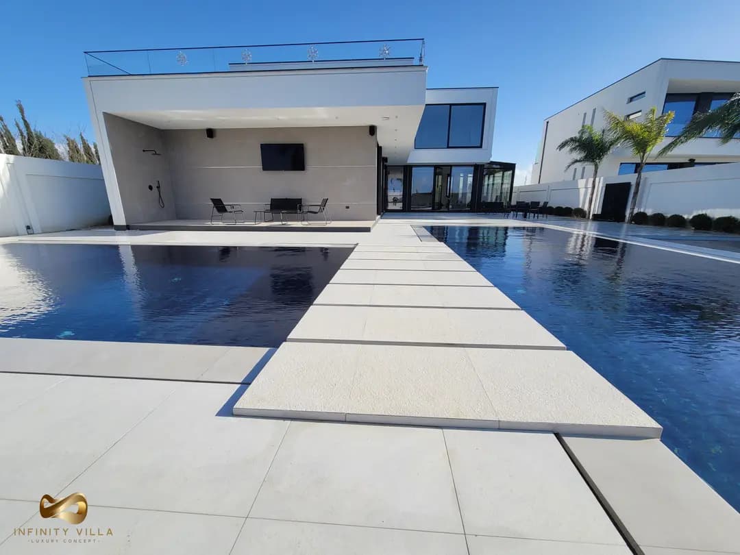 Villa pool with the bay beyond